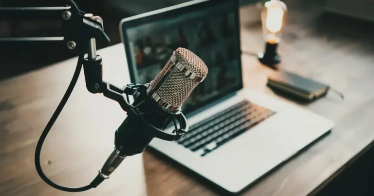 10 Best Meditation Podcast I’m in Love With 2024 76 Best Meditation Podcast: there is a microphone and a laptop