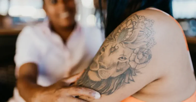 20+ Tattoo Symbol Protection: My Personal Favorites 2024 197 Tattoo Symbol Protection: a woman shoes her tattoo on her arm