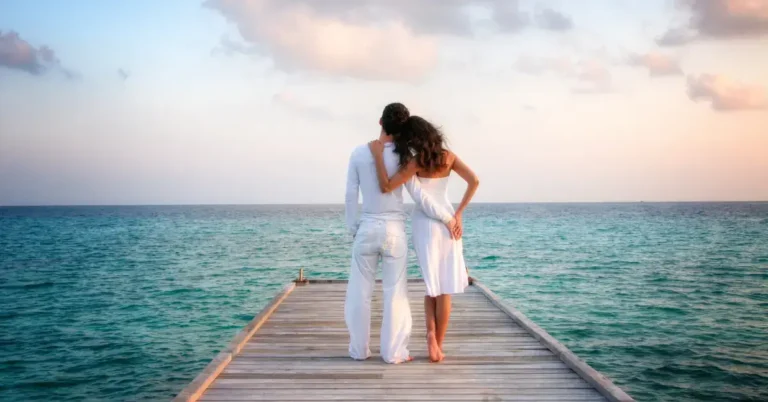 20+ Spiritual Aesthetic Art Love: My Personal Favorites 2024 29 Spiritual Aesthetic Art Love: a couple stay on a bridge at the beach and stay in arms.
