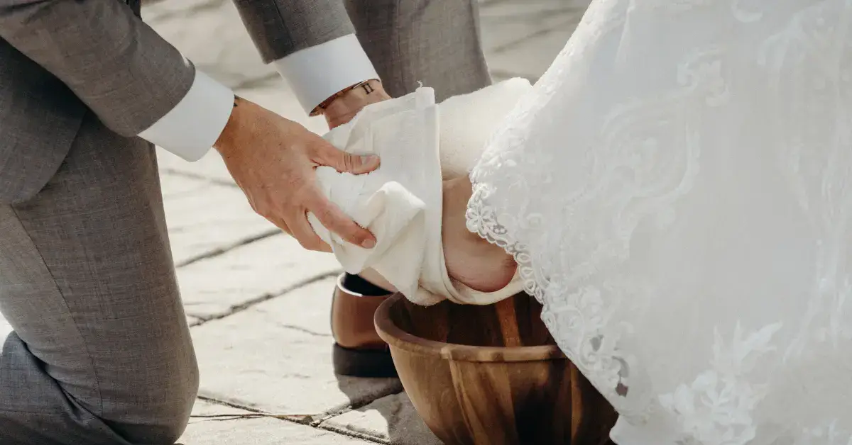 Spiritual Significance of Feet Washing: Cultural Context 2024 1 Spiritual Significance of Feet Washing: there are two people and the one is washing the feet