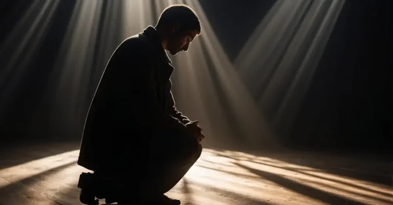 How to Pray When Under Spiritual Attack: A Friendly Guide 2024 1 How to Pray When Under Spiritual Attack: A figure kneeling in prayer, surrounded by dark, swirling shadows. A bright, radiant light emanates from the figure, dispelling the darkness